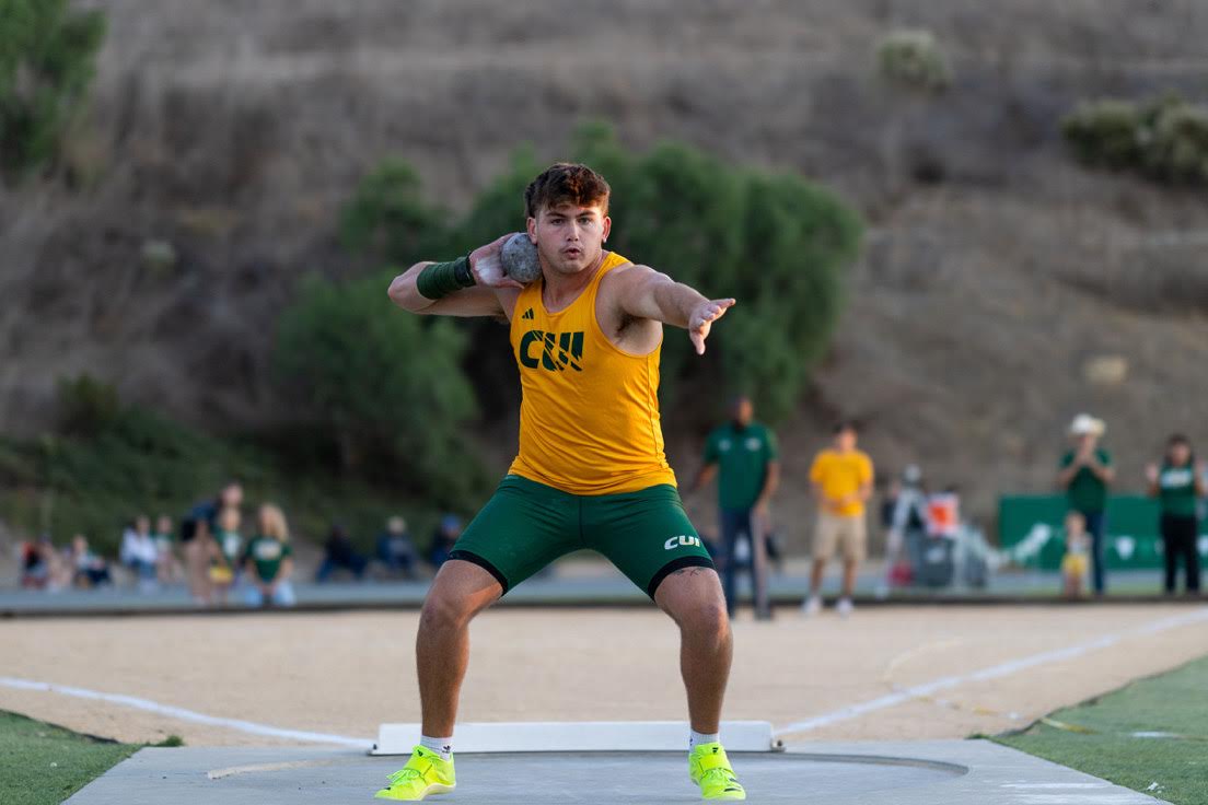 Trey Vergenz winds up his shot put throw.